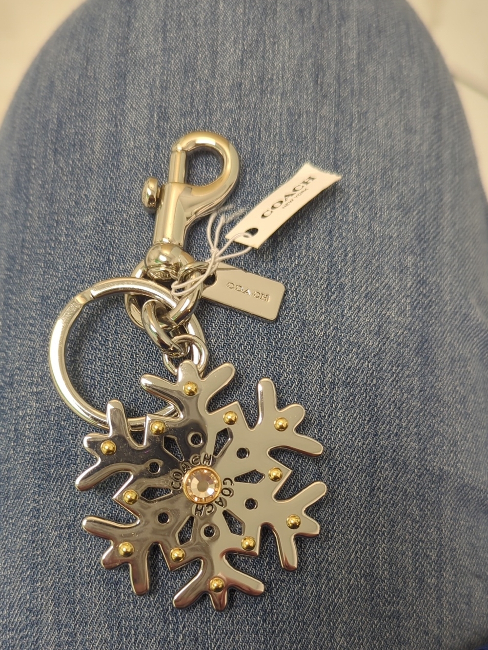 Coach Silver Snowflake Keychain with Gold Accents